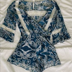 LF romper with crochet and floral detailing